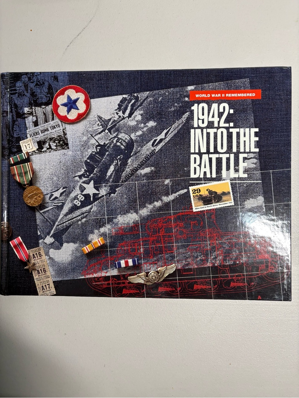 Source Unknown 1942: Into the Battle Coffee Table Book - Navy & Red